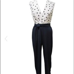 Sandra Darren: polka dot cap, sleeved jumpsuit.